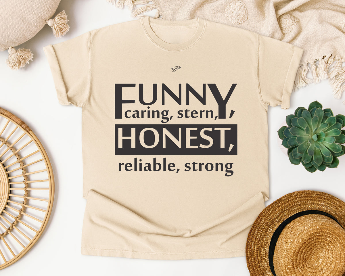 Funny Caring Stern Honest Reliable Strong Grey graphic tee in Ivory