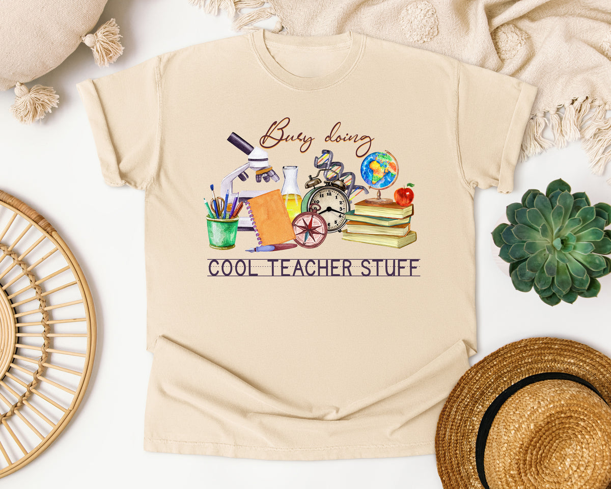 Busy Doing Cool Teacher Stuff graphic tee in Ivory