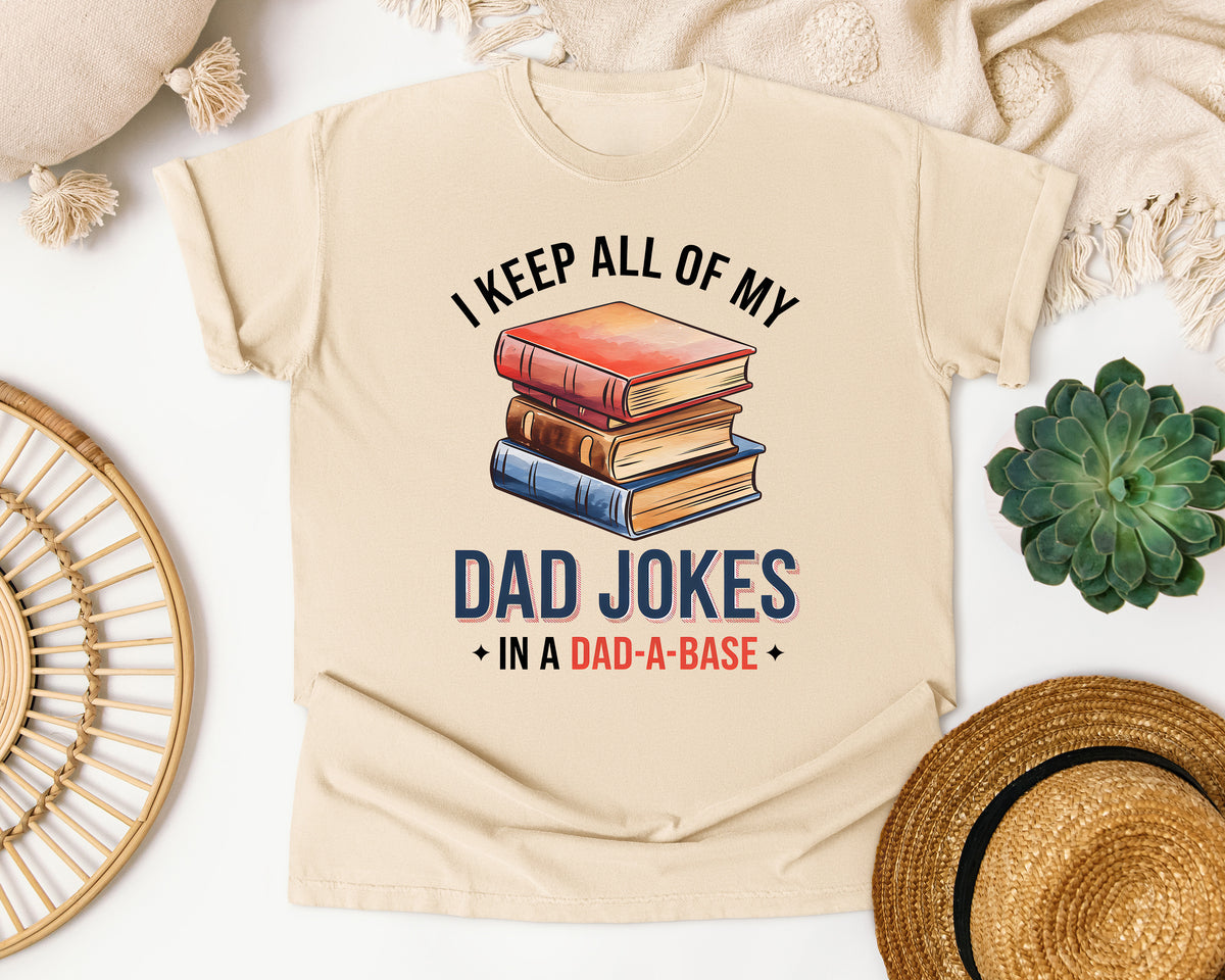 I Keep All Of My Dad Jokes In A Dad-A-Base graphic tee in Ivory