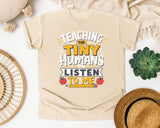 Teaching The Tiny Humans To Listen To Me graphic tee in Ivory