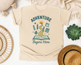Adventure Begins Here Book graphic tee in Ivory