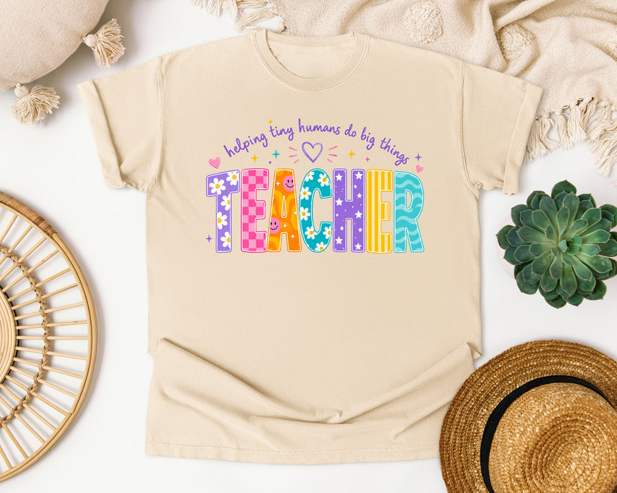 Teacher Helping Tiny Humans Do Big Things graphic tee in Ivory