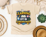 Learning Is My Superpower graphic tee in Ivory