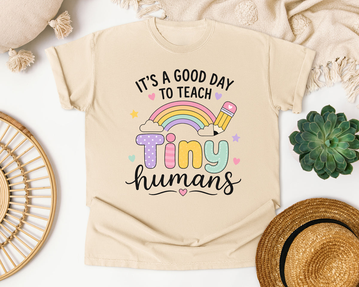 Its A Good Day To Teach Tiny Humans Pastel graphic tee in Ivory