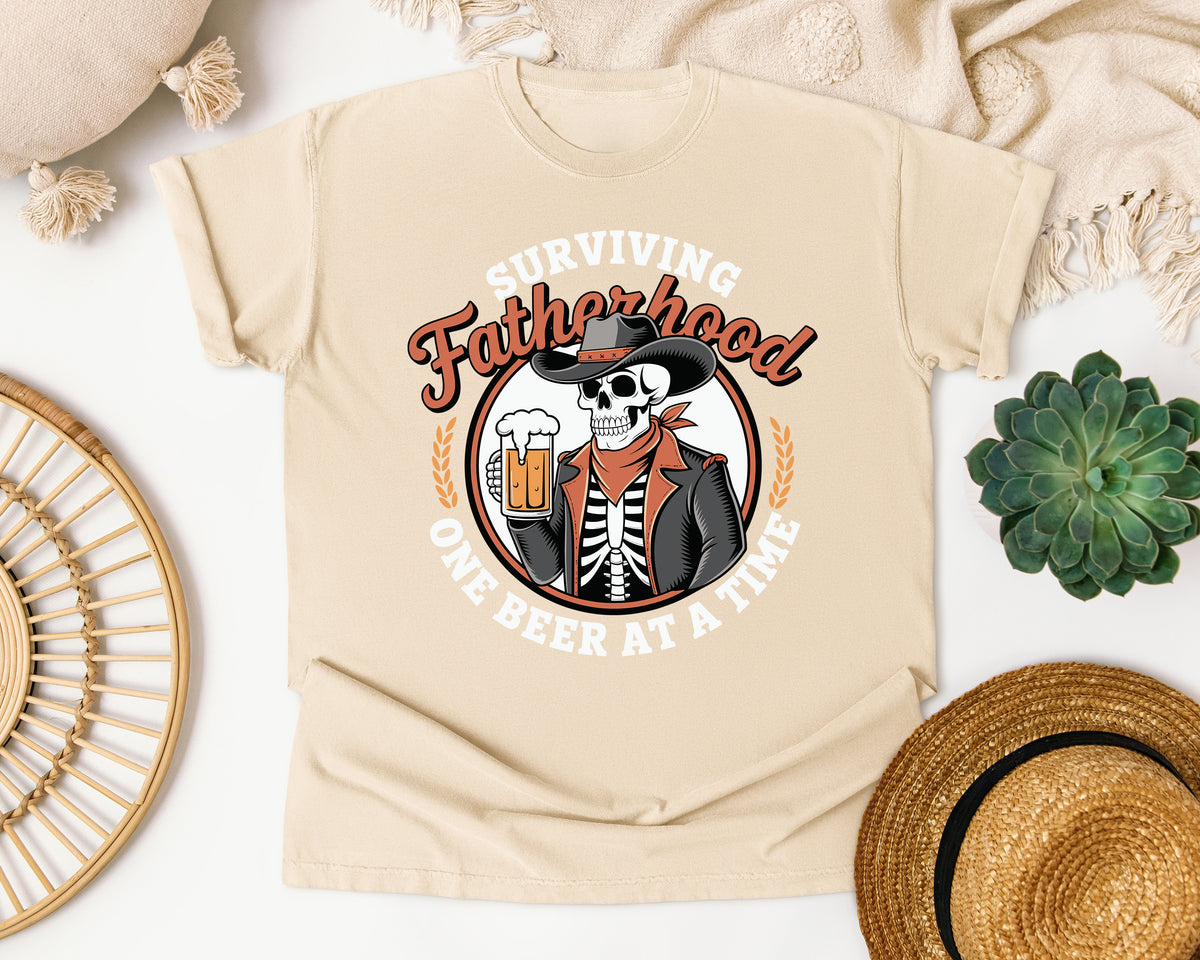Surviving Fatherhood One Beer At A Time Brown graphic tee in Ivory