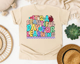 Its A Beautiful Day For Learning graphic tee in Ivory