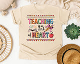 Teaching Is A Work Of Heart Grey 2 graphic tee in Ivory