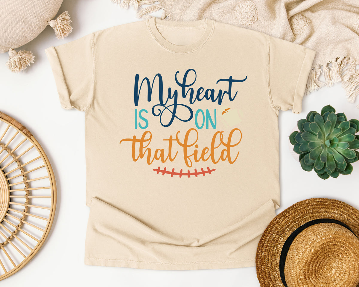 My Heart Is On That Field Navy graphic tee in Ivory