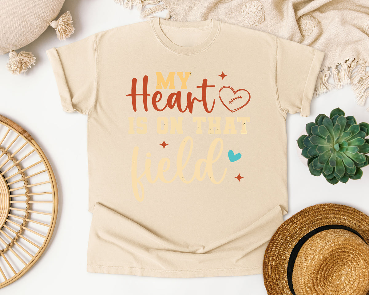 My Heart Is On That Field Gold graphic tee in Ivory