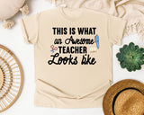 This Is What An Awesome Teacher Looks Like graphic tee in Ivory