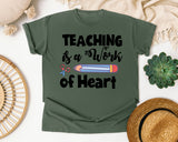 Teaching Is A Work Of Heart Pencil graphic tee in Moss