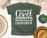 3rd Grade Level Unlocked White graphic tee in Moss