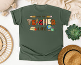 Livin That Teacher Life graphic tee in Moss