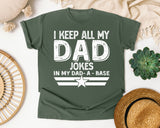 I Keep All My Dad Jokes In My Dad-A-Base White graphic tee in Moss
