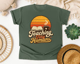 Teaching Tiny Humans Retro Sunset graphic tee in Moss