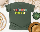 Teacher Mode On graphic tee in Moss
