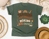 Teaching Tiny Humans Making Big Impact graphic tee in Moss