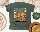 Teach Love Inspire Orange graphic tee in Moss