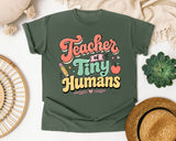 Teacher Of Tiny Humans Retro graphic tee in Moss