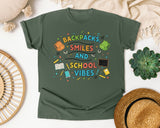 Backpacks Smiles And School Vibes Doodle graphic tee in Moss