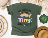 Its A Good Day To Teach Tiny Humans Pastel graphic tee in Moss