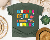 Teacher Of Tiny Humans Pencil graphic tee in Moss