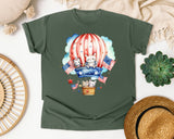 Bunnies In Hot Air Balloon graphic tee in Moss