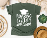 Roaring Into 3rd Grade White 2 graphic tee in Moss
