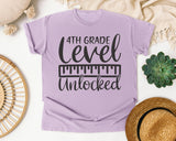 4th Grade Level Unlocked Grey graphic tee in Orchid