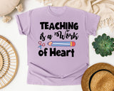 Teaching Is A Work Of Heart Pencil graphic tee in Orchid