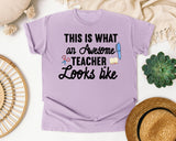 This Is What An Awesome Teacher Looks Like graphic tee in Orchid