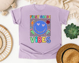 First Grade Vibes Checkered Smiley graphic tee in Orchid