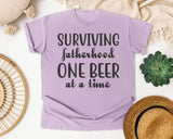 Surviving Fatherhood One Beer At A Time Grey 2 graphic tee in Orchid
