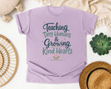 Teaching Tiny Humans And Growing Kind Hearts graphic tee in Orchid