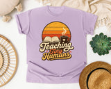 Teaching Tiny Humans Retro Sunset graphic tee in Orchid