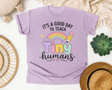 Its A Good Day To Teach Tiny Humans Pastel graphic tee in Orchid