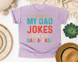 I Keep All My Dad Jokes In A Dad A Base graphic tee in Orchid
