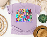 Its A Beautiful Day For Learning graphic tee in Orchid