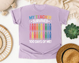 My Teacher Survived 100 Days Of Me Crayons graphic tee in Orchid
