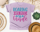 Roaring My Into 1st Grade graphic tee in Orchid