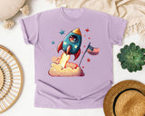 Rocket With American Flag graphic tee in Orchid