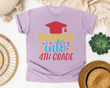 Roaring Into 4th Grade White 2 3 graphic tee in Orchid