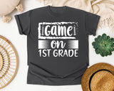 Game On 1st Grade White graphic tee in Pepper