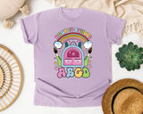 Back To School Rainbow Backpack in Orchid Comfort Colors 1717 tee