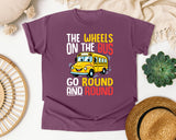 The Wheels On The Bus Light Print in Berry Comfort Colors 1717 tee