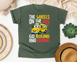 The Wheels On The Bus Light Print in Moss Comfort Colors 1717 tee