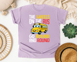 The Wheels On The Bus Light Print in Orchid Comfort Colors 1717 tee