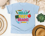 Hello First Grade Crayons in Chambray Comfort Colors 1717 tee