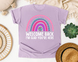 Welcome Back I'm Glad You're Here Rainbow in Orchid Comfort Colors 1717 tee