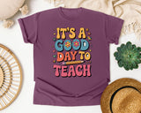 It's A Good Day To Teach Flowers in Berry Comfort Colors 1717 tee
